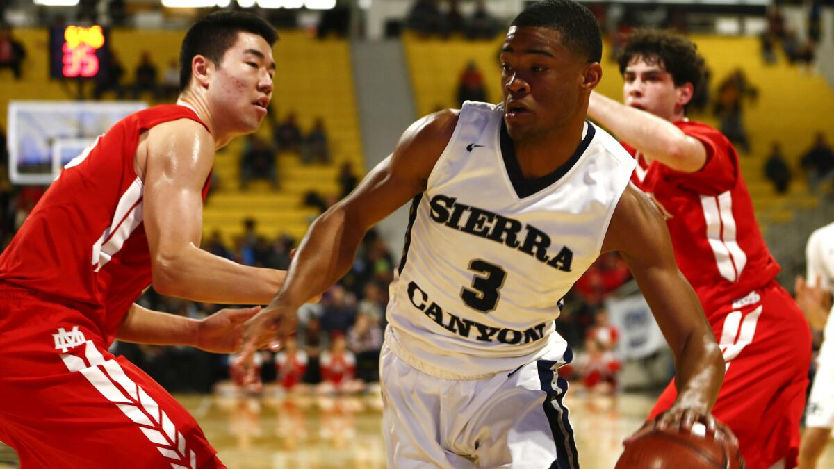 Sierra Canyon's Cassius Stanley drives to the basket against the Mater Dei Monarchs on March 2, 2018, in Long Beach.