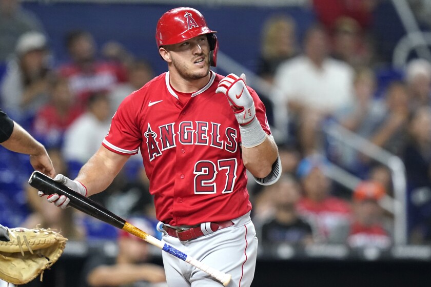 Angels' Mike Trout reacts after he struck out swinging during the fourth inning against the Miami Marlins.