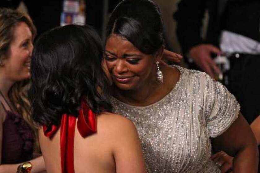 Octavia Spencer, being congratulated for winning an Oscar in February for her role in "The Help," has been invited to join the academy.