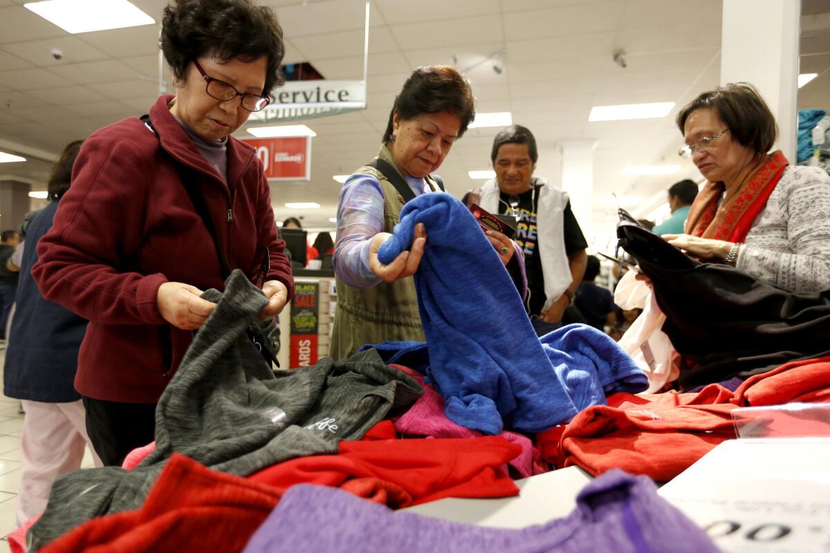 Deal hunters begin the holiday shopping season at JCPenney at Westfield Culver City.