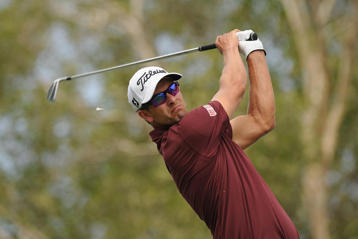 Adam Scott tees off on the 10th hole during the Australian PGA Championship at Royal Pines Resort on Dec. 14.