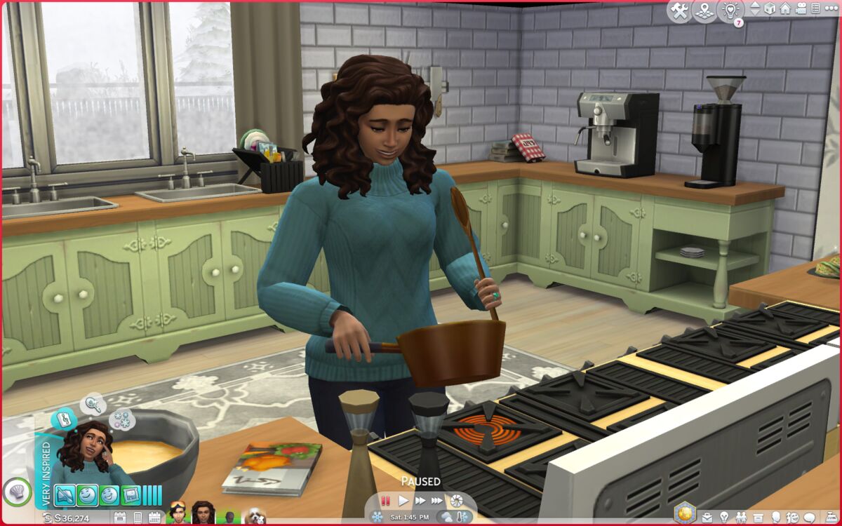 Lauren J. Mapp’s Simself — Lolo Simile — cooks mac and cheese in the kitchen for lunch.