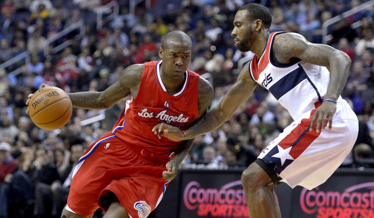 Clippers guard Jamal Crawford drives against Wizards forward Rasual Butler in the first half Friday night.