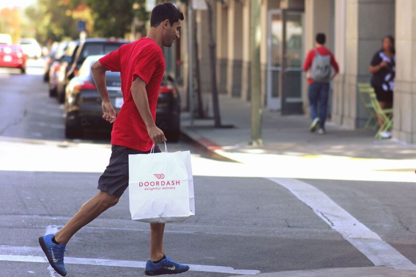DoorDash is an on-demand restaurant delivery service. DoorDash was founded in 2013 by Stanford students Evan Charles Moore, Andy Fang, Stanley Tang and Tony Xu. (DoorDash/TNS) ** OUTS - ELSENT, FPG, TCN - OUTS **