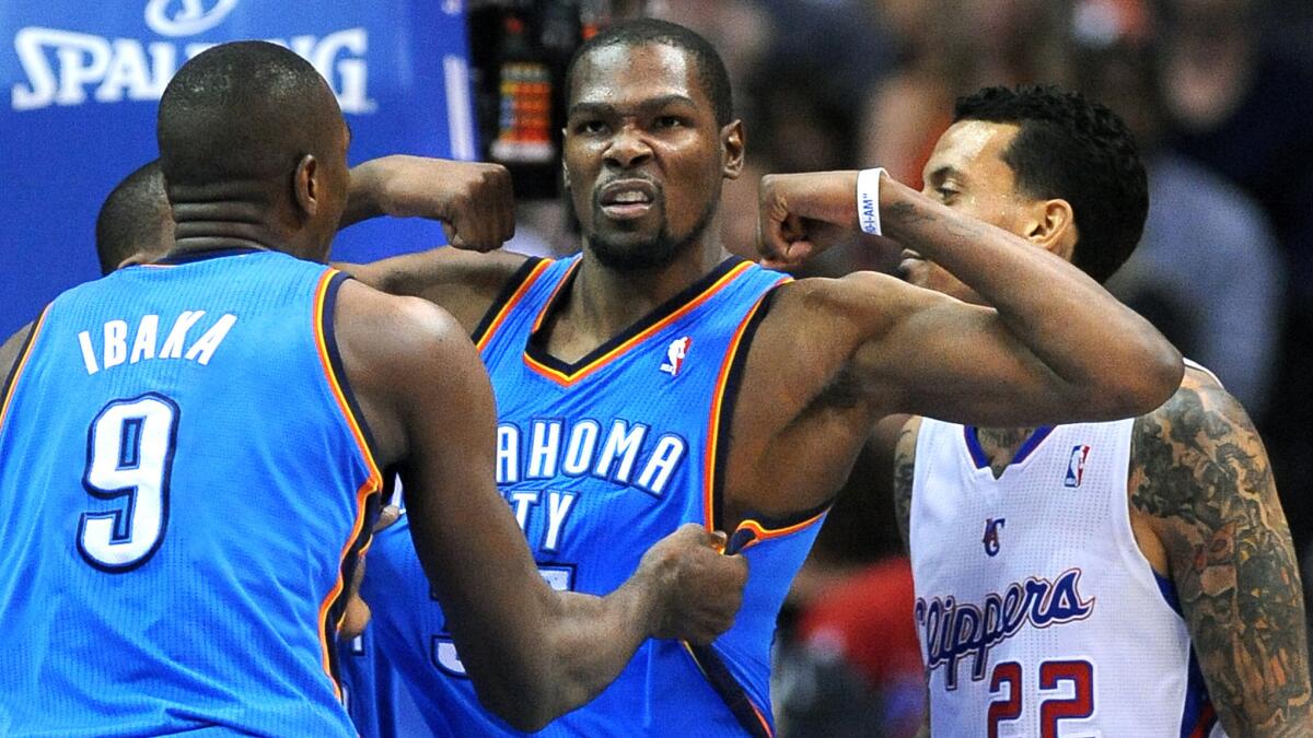 Oklahoma City Thunder forward Kevin Durant flexes after being fouled in Game 4 of the Western Conference semifinals against the Clippers.