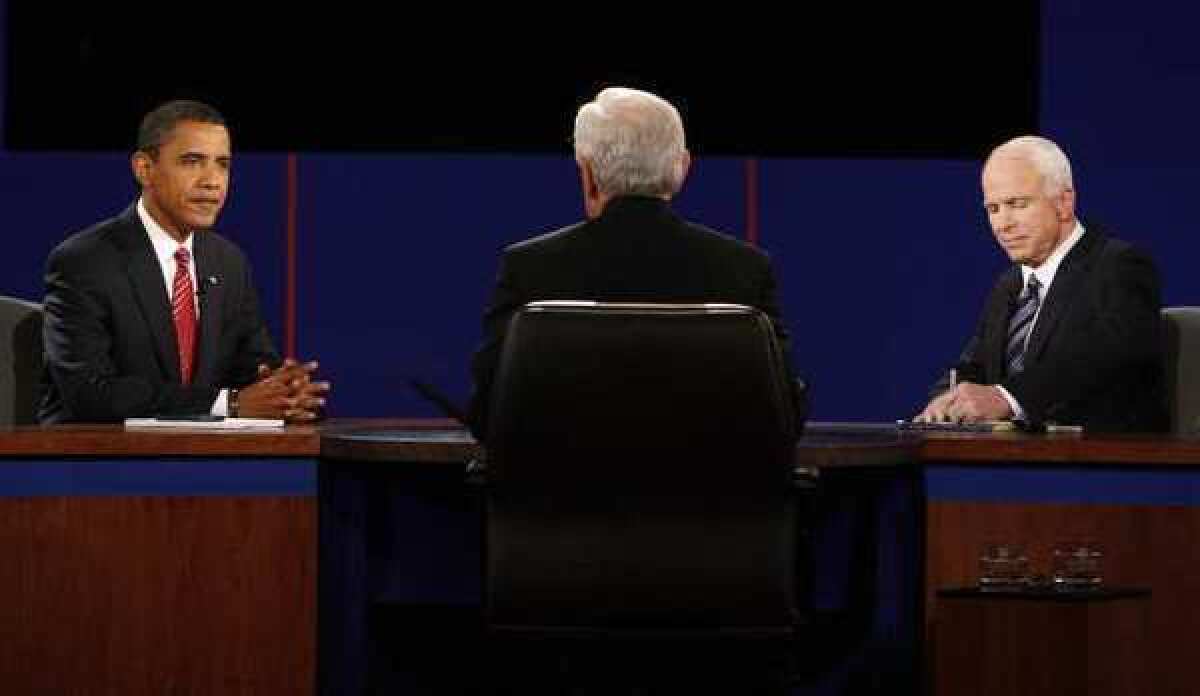 In 2008, then-Democratic presidential candidate Barack Obama and Republican presidential candidate John McCain exchange responses as debate moderator Bob Schieffer listens during a presidential debate.
