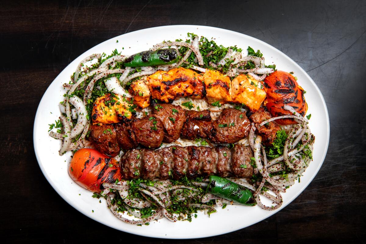 The mixed grill platter includes chicken kabob, beef kabob and kafta kabob (spiced ground beef).