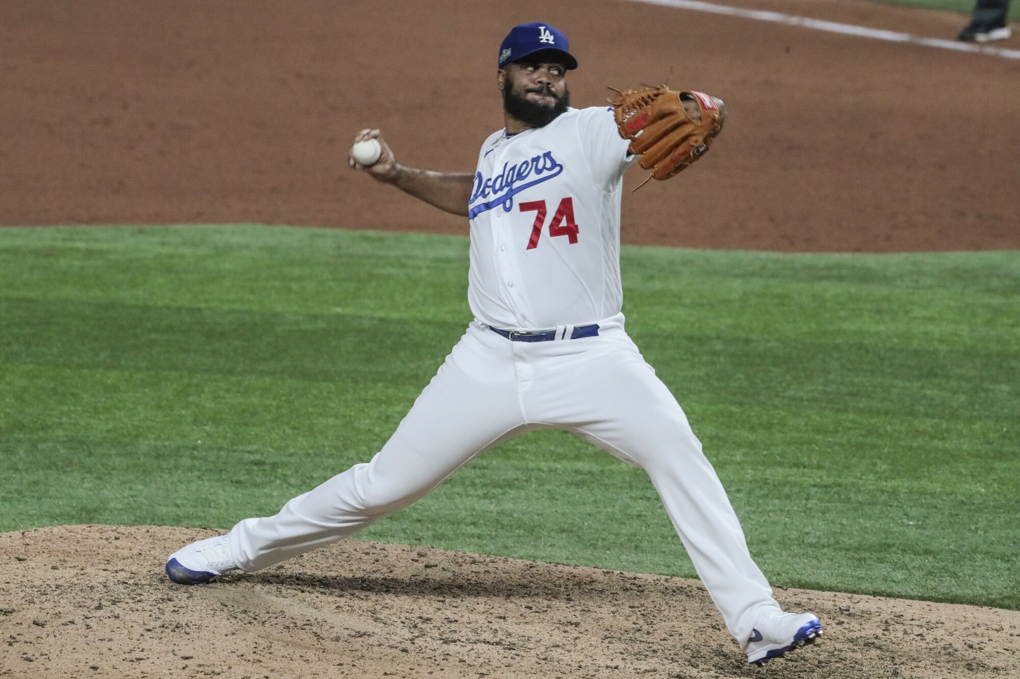 Dodgers closer Kenley Jansen delivers during the ninth inning of a 5-1 win over the San Diego Padres on Tuesday.