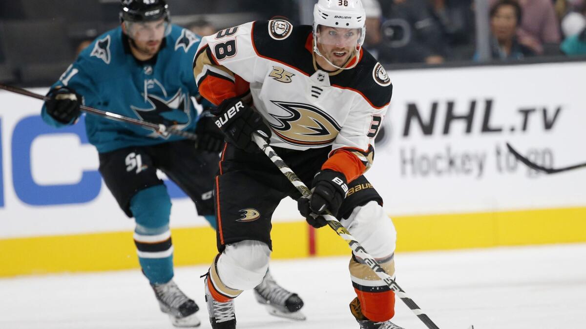 Ducks' Derek Grant carries the puck during the second period of the team's preseason game against the San Jose Sharks in San Jose on Tuesday.