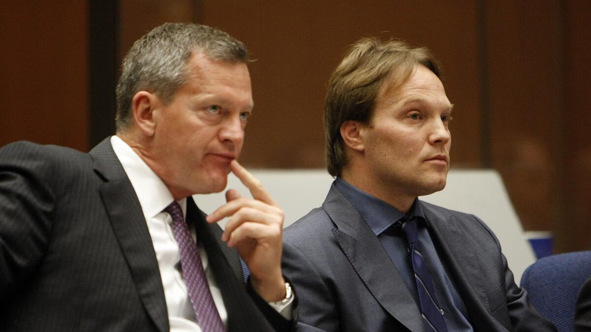 UCLA chemistry professor Patrick Harran, right, sits with his attorney, Thomas O'Brien, in Superior Court on Friday where he struck a deal with prosecutors that all but frees him from criminal liability in a 2008 laboratory fire that killed staff research assistant Sheharbano "Sheri" Sangji.