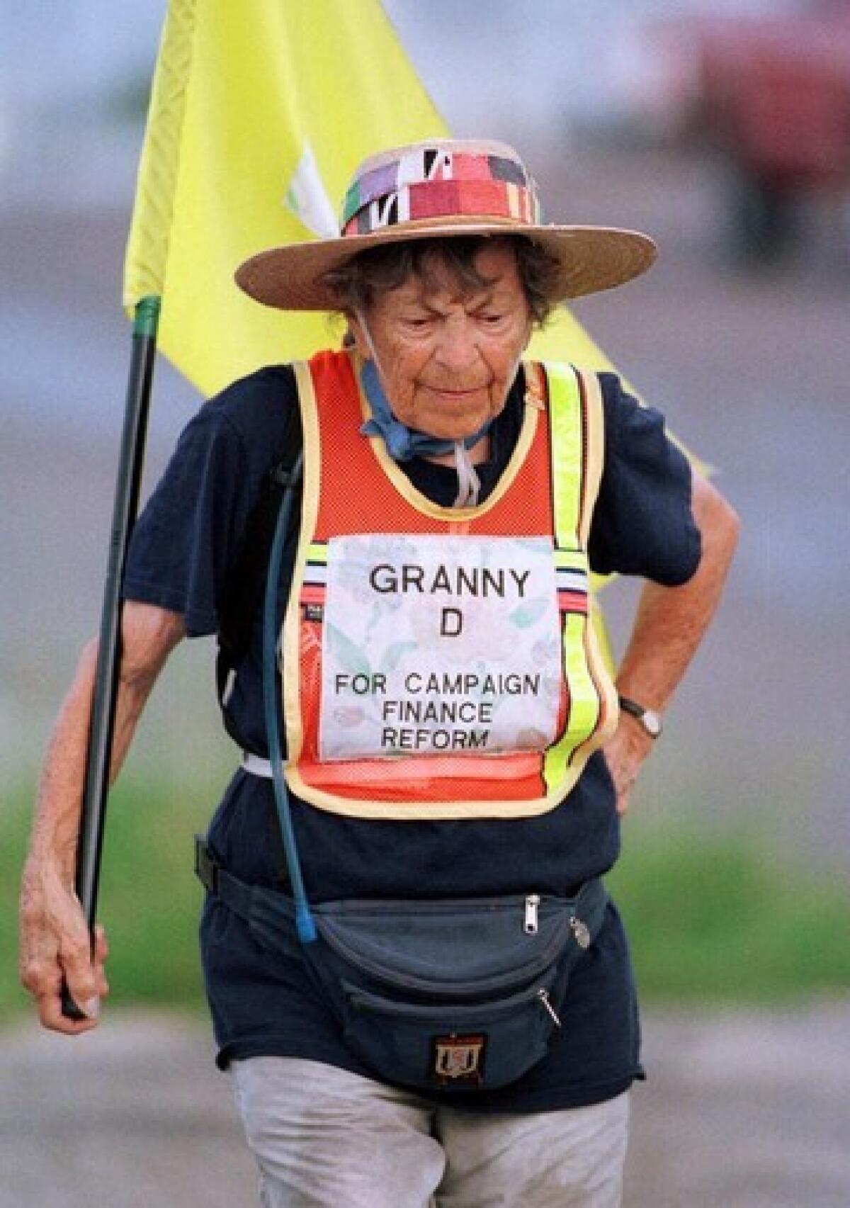 Doris Haddock walks along a Texas highway during her cross-country hike. She later ran unsuccessfully for a U.S. Senate seat.