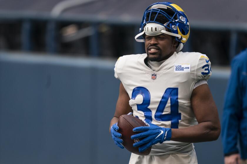 Los Angeles Rams running back Malcolm Brown is pictured on the field during warmups before an NFL football game against the Seattle Seahawks, Sunday, Dec. 27, 2020, in Seattle. The Seahawks won 20-9. (AP Photo/Stephen Brashear)