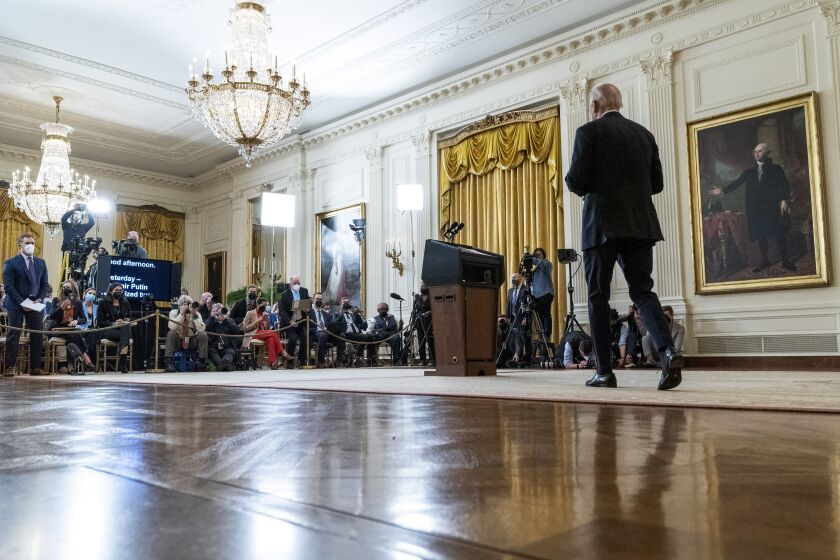 President Joe Biden arrives to speak about Ukraine in the East Room of the White House, Tuesday, Feb. 22, 2022, in Washington. (AP Photo/Alex Brandon)