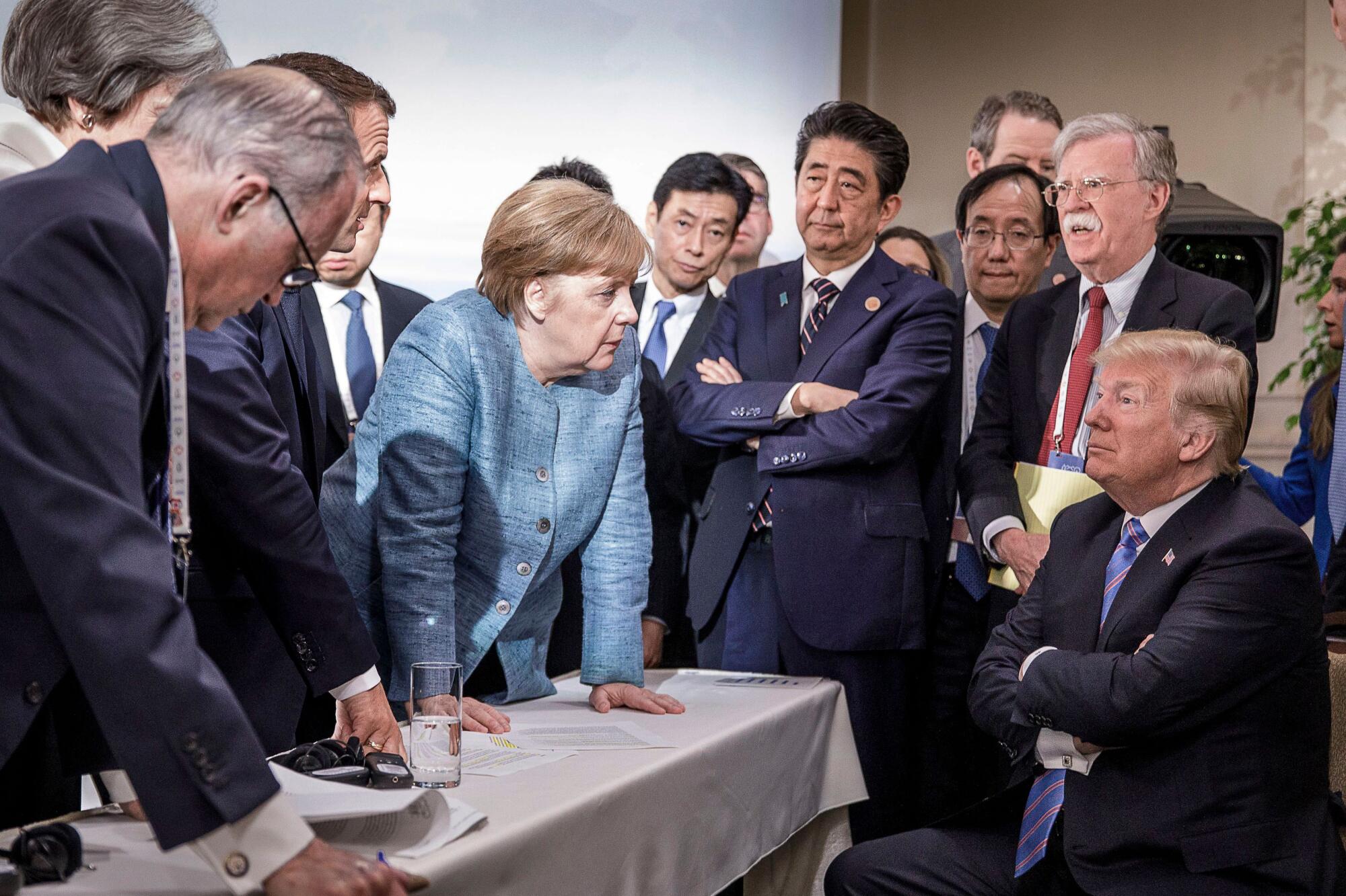 In 2018, Japanese Prime Minister Shinzo Abe, center, at Group of 7 summit in Charlevoix, Canada.