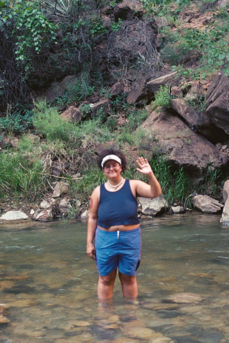 Reanna Cruz wading in the Virgin River at Zion National Park.
