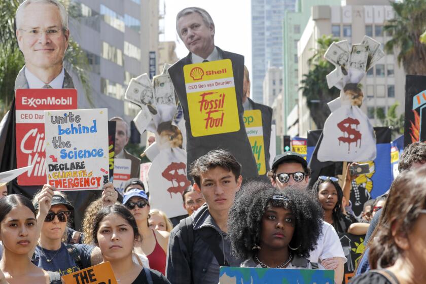 LOS ANGELES, CA - SEPTEMBER 20, 2019 — Student activists rally in a climate change protest in Pershing Square, Los Angeles on Friday afternoon September 20, 2019 as part of the global climate walkout movement. The global climate strike protests have been inspired by Greta Thunberg, a 16-year-old Swedish activist who sailed across the Atlantic Ocean in a zero-emission yacht rather than fly and on Wednesday met with members of Congress, urging them to heed scientists’ warnings on climate change. (Irfan Khan/Los Angeles Times)