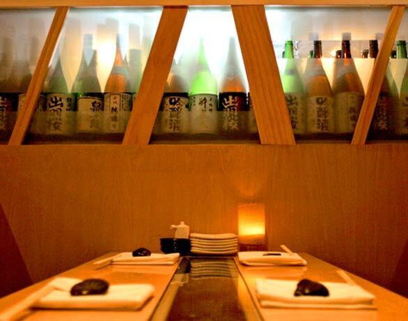 At Izakaya Zero in Huntington Beach, chef Takashi Abes new restaurant, sake and beer are offered to accompany the updated Japanese pub-style fare.