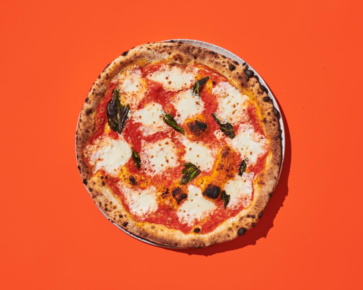 An overhead shot of a margherita pizza from Roberta's