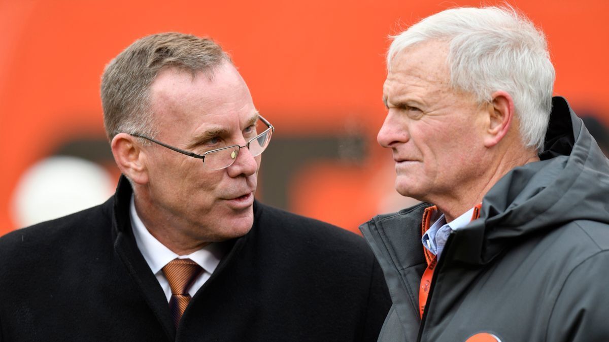 Cleveland Browns general manager John Dorsey, left, talks with owner Jimmy Haslam before a game against the Green Bay Packers in Cleveland on Sunday.