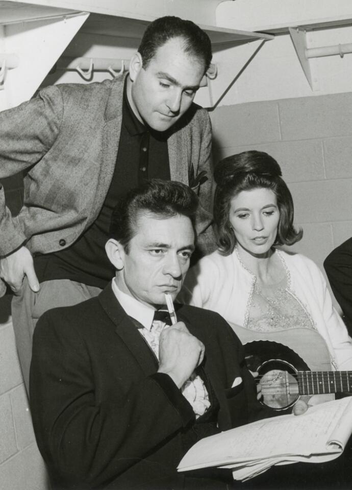 A documentary about Johnny Cash; his talented but troubled manager, Saul Holiff; and Holiff's strained relationship with his son. Directed by Jonathan Holiff. New Chapter Productions