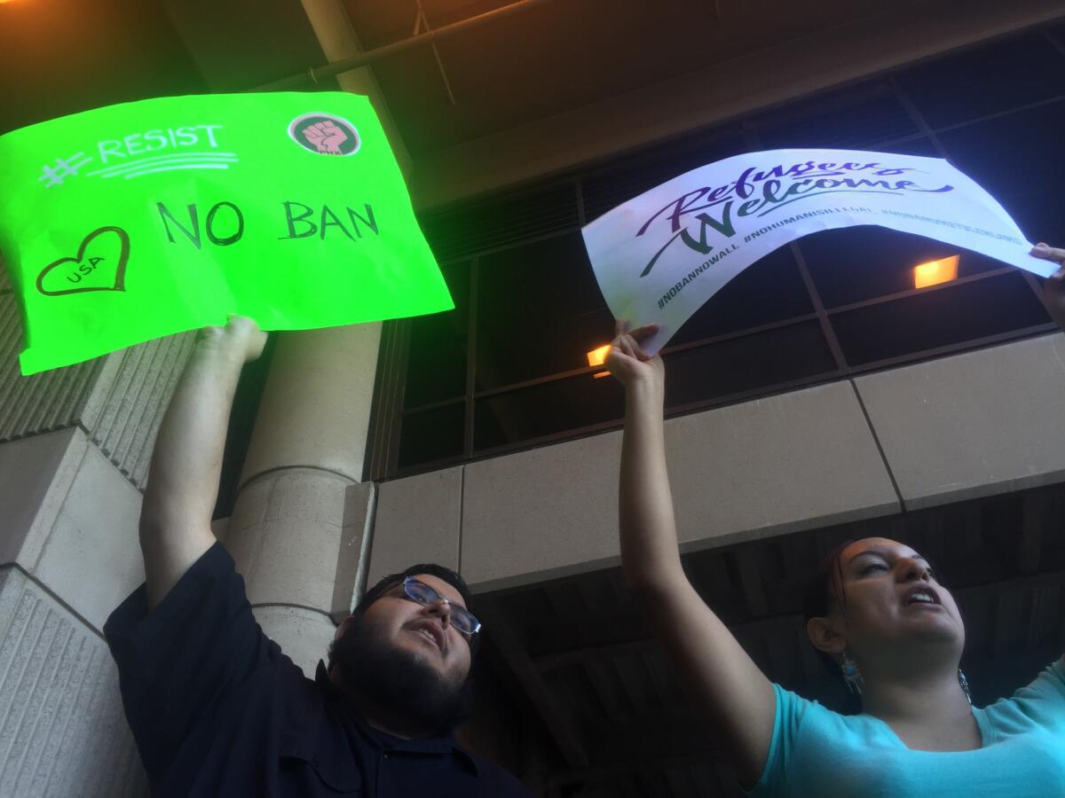 Elijah Chavez and Brandi Hernandez protest in Phoenix