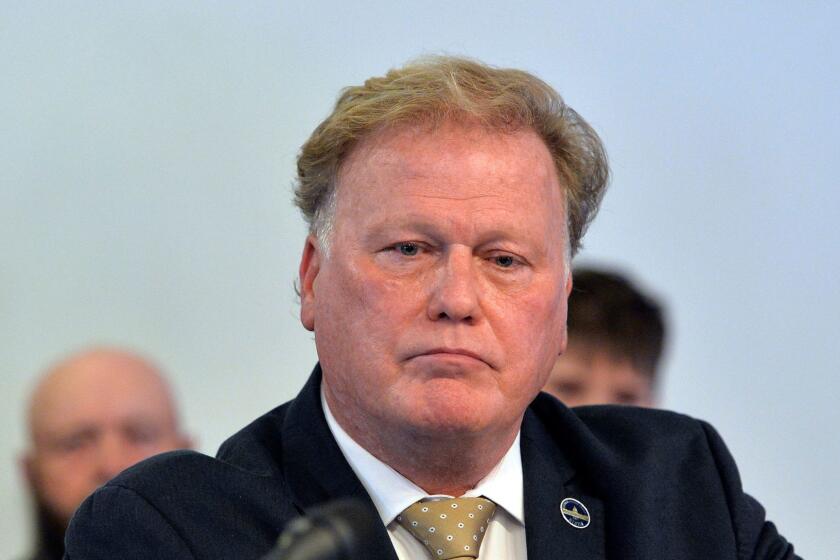 FILE- In this Tuesday, Dec. 12, 2017, file photo, Kentucky State Rep. Republican Dan Johnson addresses the public from his church regarding sexual assault allegations in Louisville, Ky. Bullitt County Sheriff Donnie Tinnell said Johnson committed suicide on Wednesday, Dec. 13, in Mount Washington, Ky. (AP Photo/Timothy D. Easley, File)