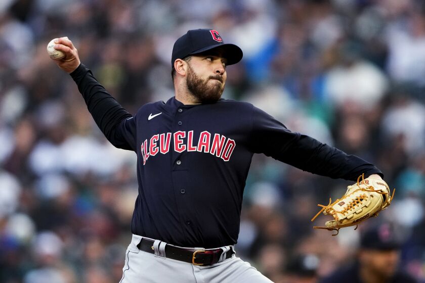 Cleveland Guardians starting pitcher Aaron Civale throws to a Seattle Mariners batter during the first inning of a baseball game Saturday, April 1, 2023, in Seattle. (AP Photo/Lindsey Wasson)