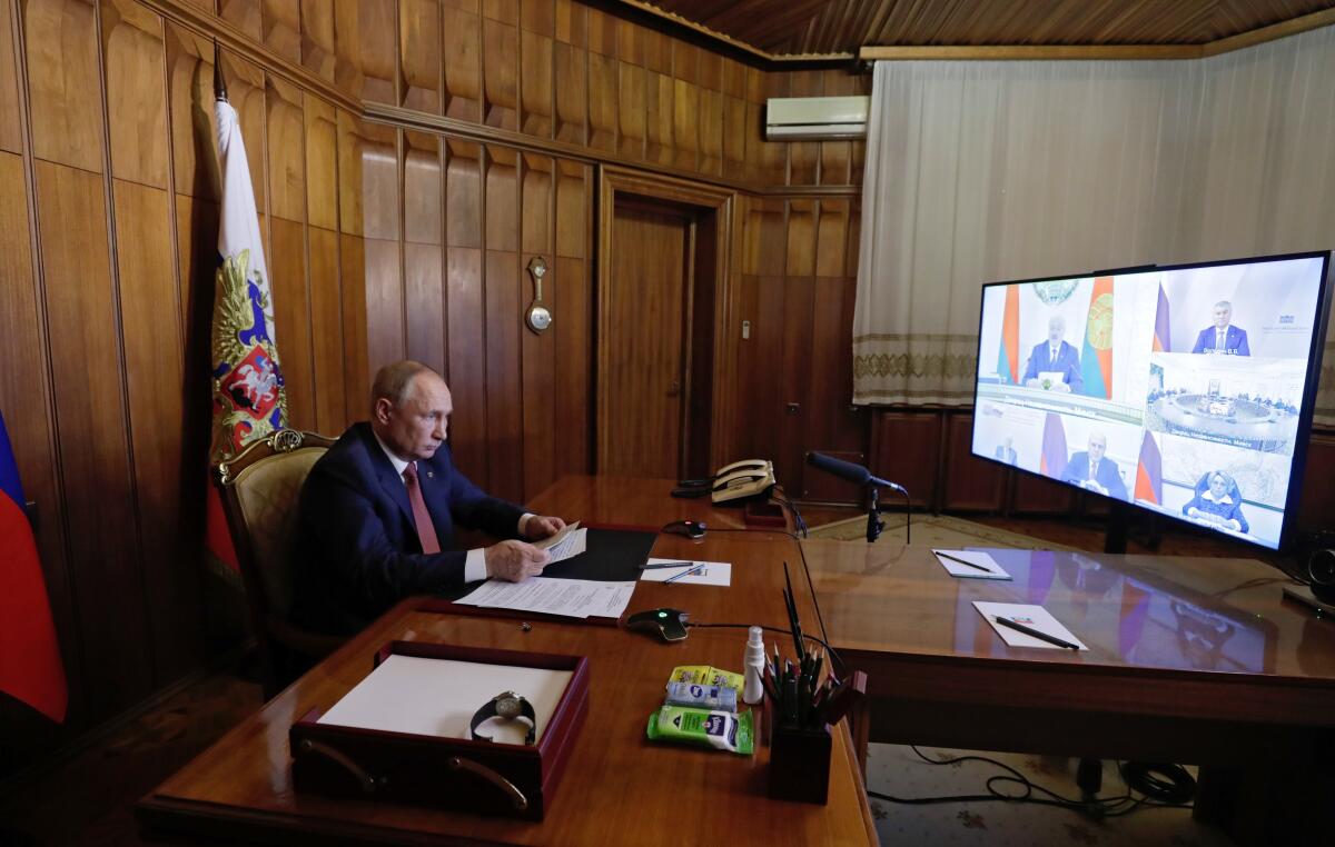 Russian President Vladimir Putin attends videoconference meeting