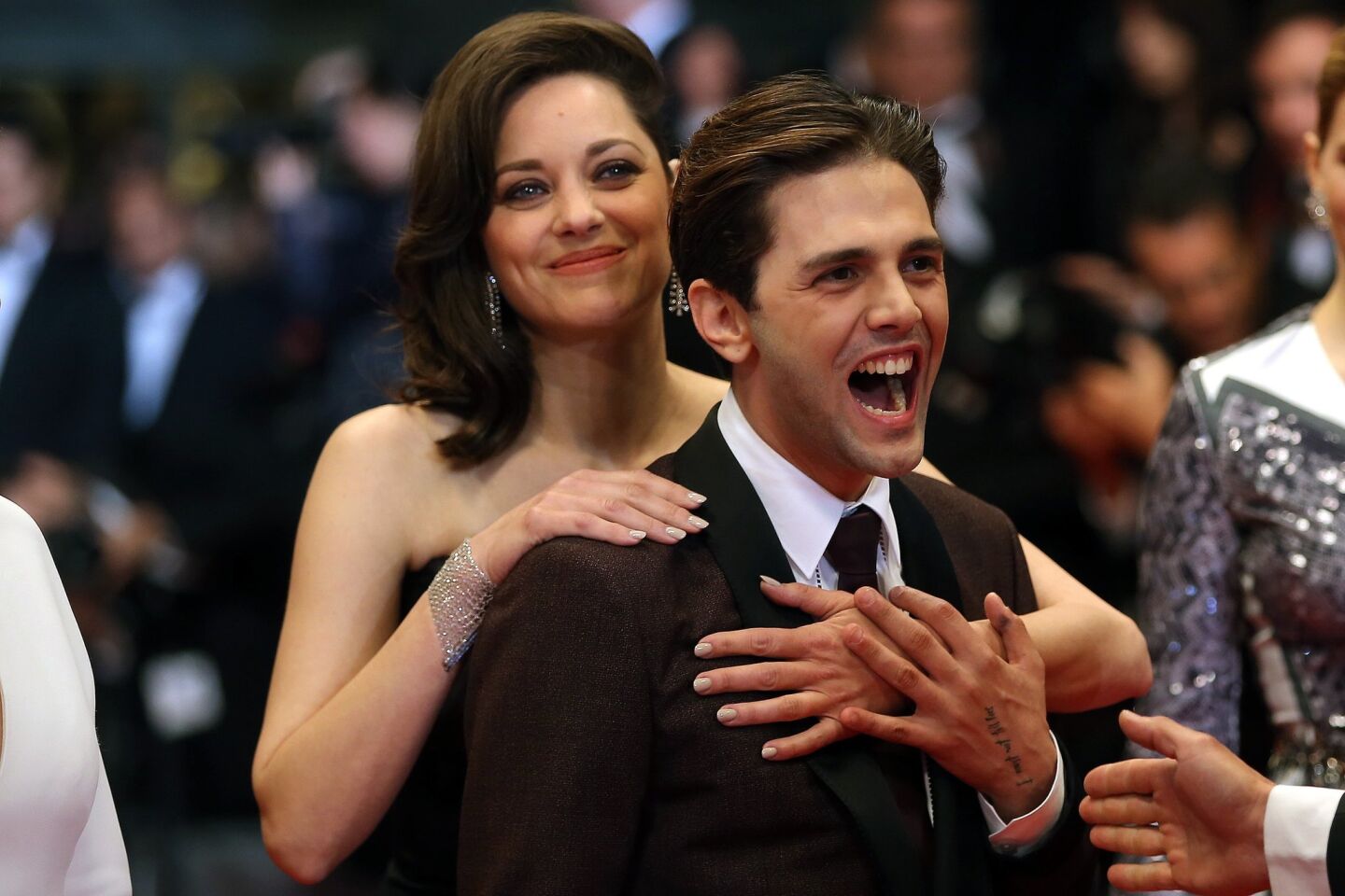 Actress Marion Cotillard and director Xavier Dolan arrive at the screening of the film "It's Only the End Of The World."