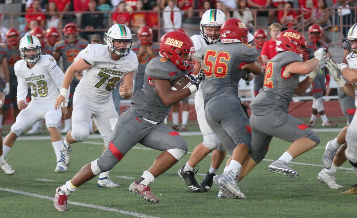 Don senior Zavien Watson found the end zone three times Friday night.