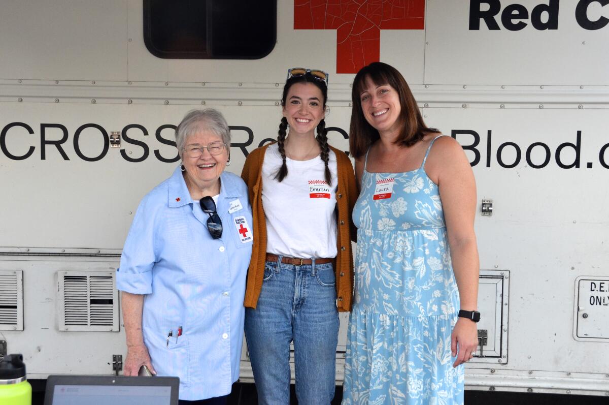 Blood drive organizer Lynda Wood, Vanguard volunteer Emersen Baumgart and donor Laura Lane.