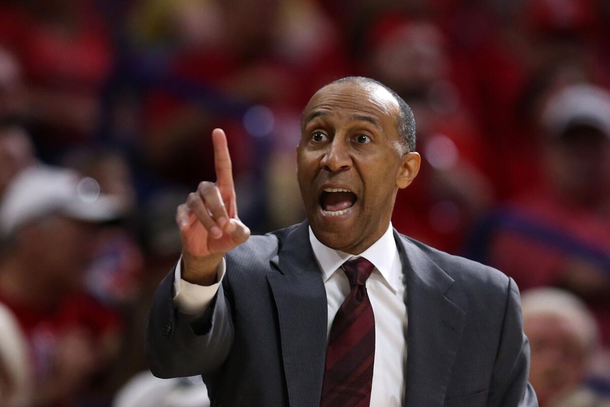 Johnny Dawkins went 156-115 overall while coaching Stanford, which fired him last week.