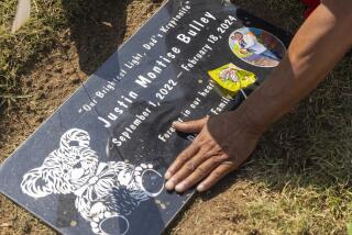 Inglewood, CA - July 18: Montise Bulley, father of Justin Bulley, at his grave in Inglewood, CA on Thursday, July 18, 2024. (Zoe Cranfill / Los Angeles Times)