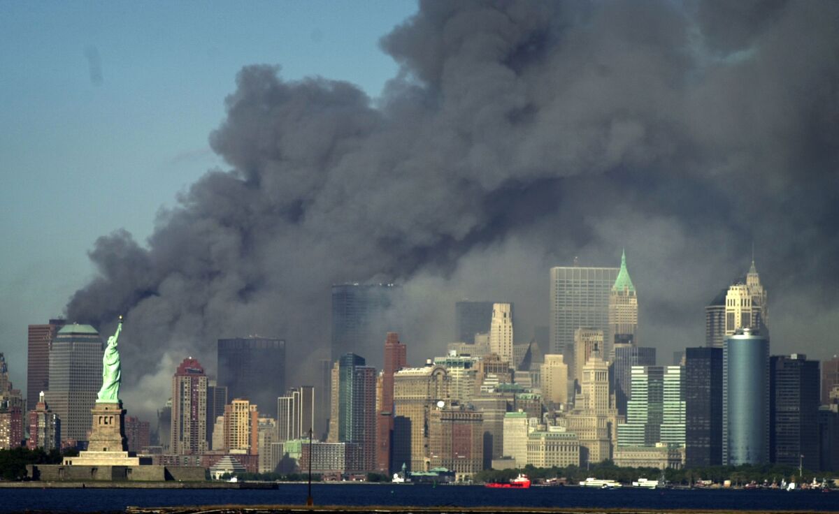 Smoke billows into the sky from the area of the  World Trade Center  on Sept. 11, 2001.  