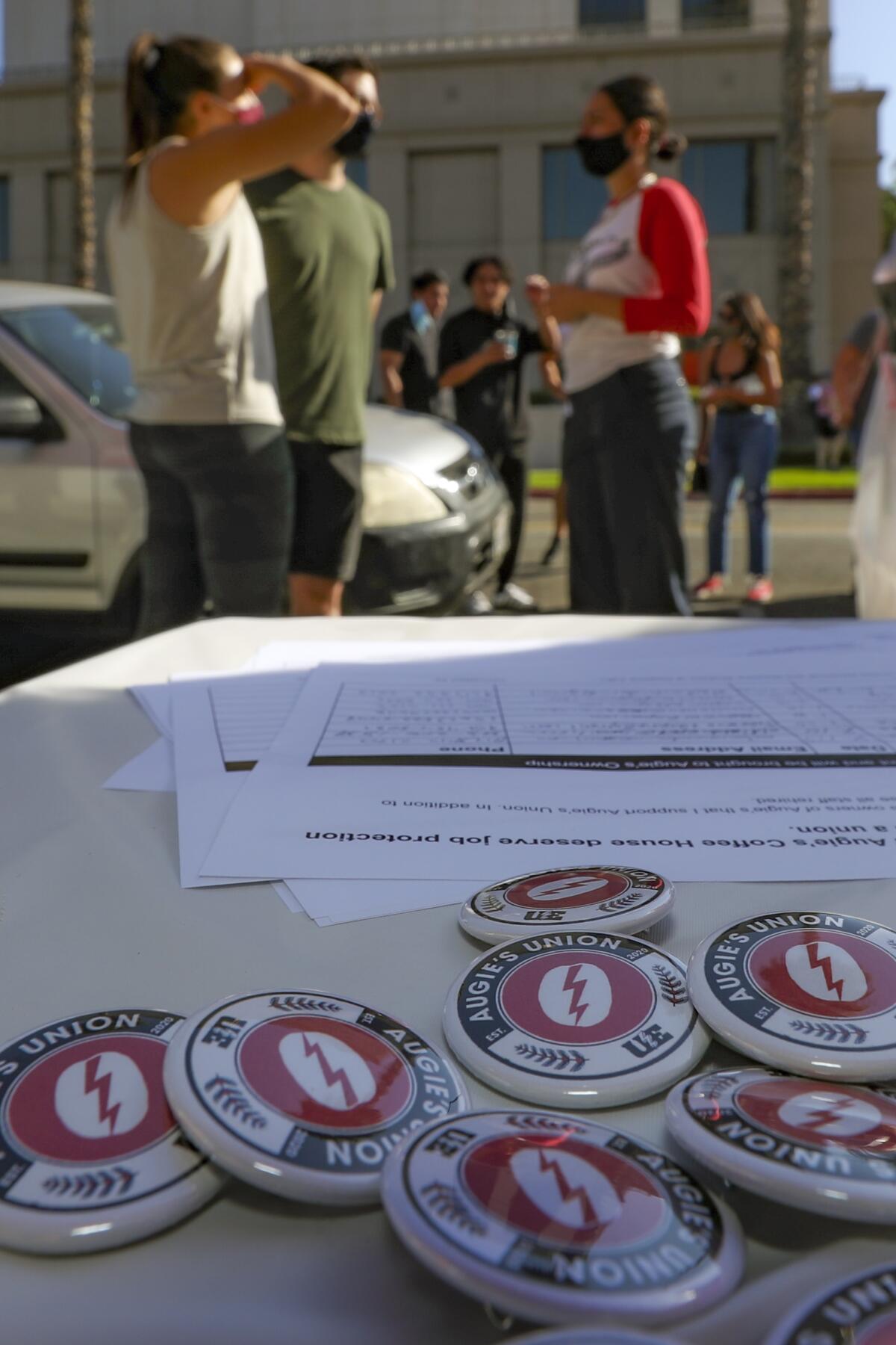 Workers organized a petition drive demanding that Augie's Coffee House to reopen. 