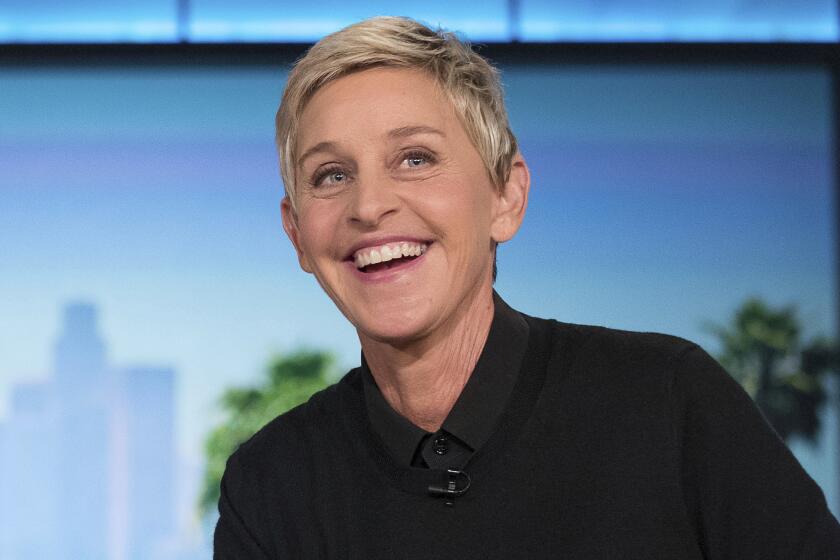 FILE - In this Oct. 13, 2016, file photo, Ellen Degeneres appears during a commercial break at a taping of "The Ellen Show" in Burbank. DeGeneres is known for keeping her comedy on the nice side. But she lets her inner meanie out for "Ellen's Game of Games." Thatâs NBC's new prime-time game show, which begins its regular run Tuesday, Jan. 2, 2018, after a December sneak peek. The hour-long show subjects its contestants to minor-league torments that, it turns out, delight host DeGeneres. (AP Photo/Andrew Harnik, File)