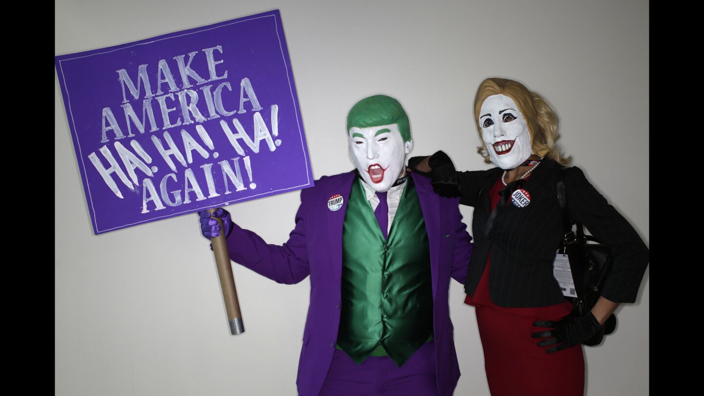 Cosplayers Nick Mollburg as Joker Donald Trump and Auburn Rutledge as Hillary Quinnton at Comic-Con International 2016 in San Diego.