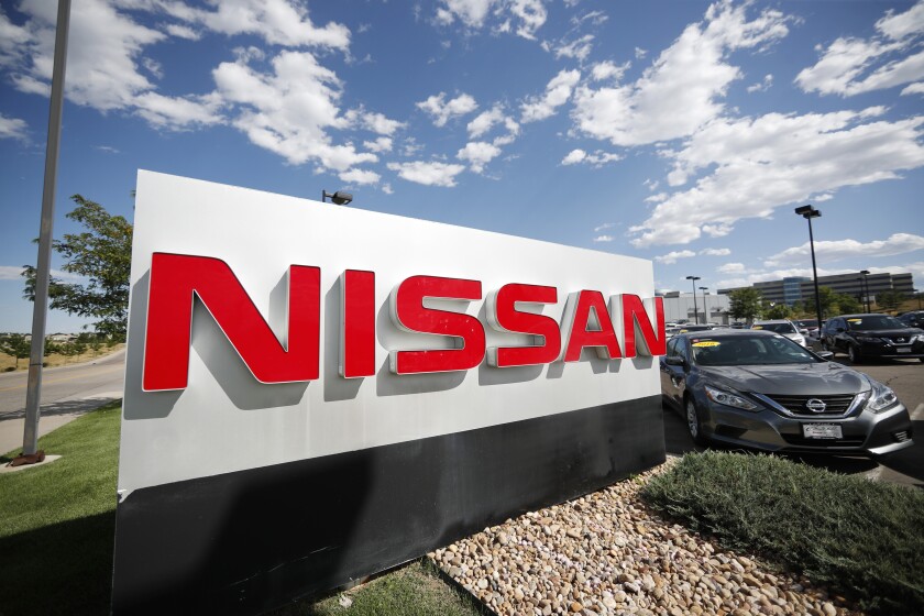 FILE - This Aug. 25, 2019, file photo shows a sign at a Nissan dealership in Highlands Ranch, Colo. Nissan is recalling nearly 346,000 vehicles worldwide to replace dangerous Takata air bag inflators that can explode and hurl shrapnel. (AP Photo/David Zalubowski)