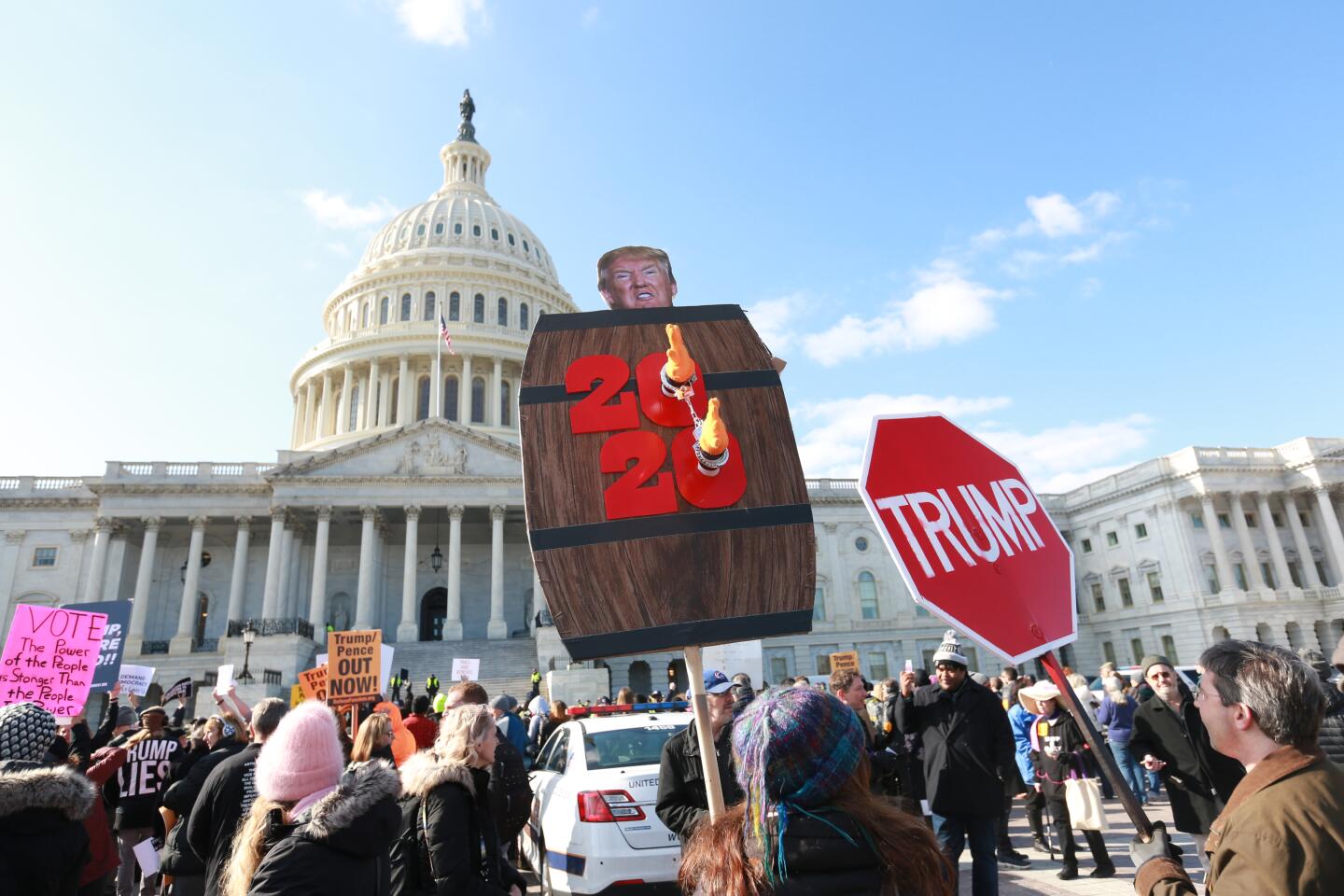 Hundreds swarm the Capitol to demand witnesses, evidence and the impeachment of President Trump in Washington, D.C., on Wednesday.
