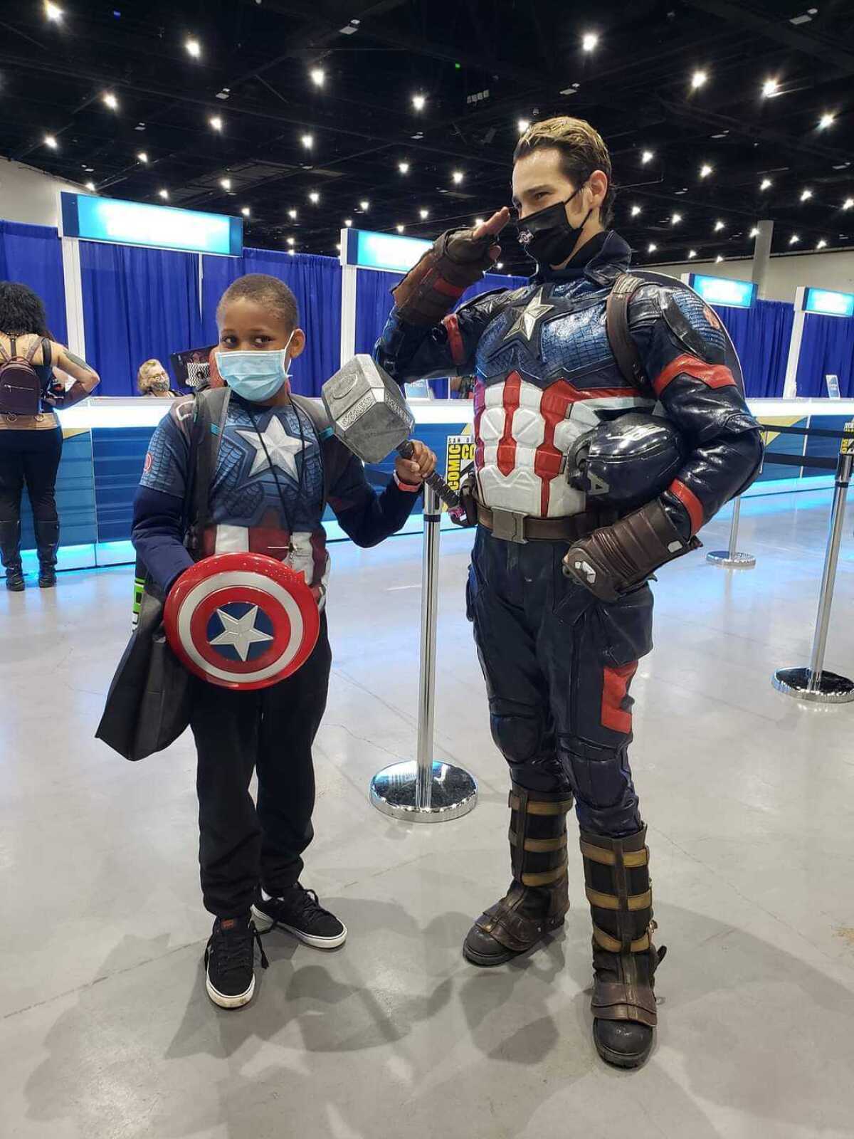 Trenton Roberts, 13, of Oceanside meets an adult Captain America