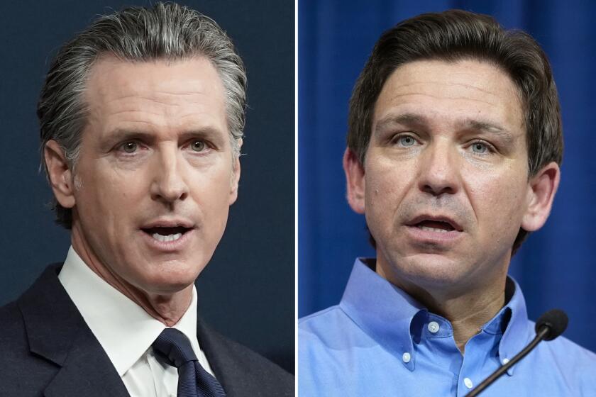 FILE - This combination of photos shows California Gov. Gavin Newsom speaking in Sacramento, Calif., on June 24, 2022, left, and Florida Gov. Ron DeSantis speaking in Sioux Center, Iowa, May 13, 2023, right. (AP Photo, File)