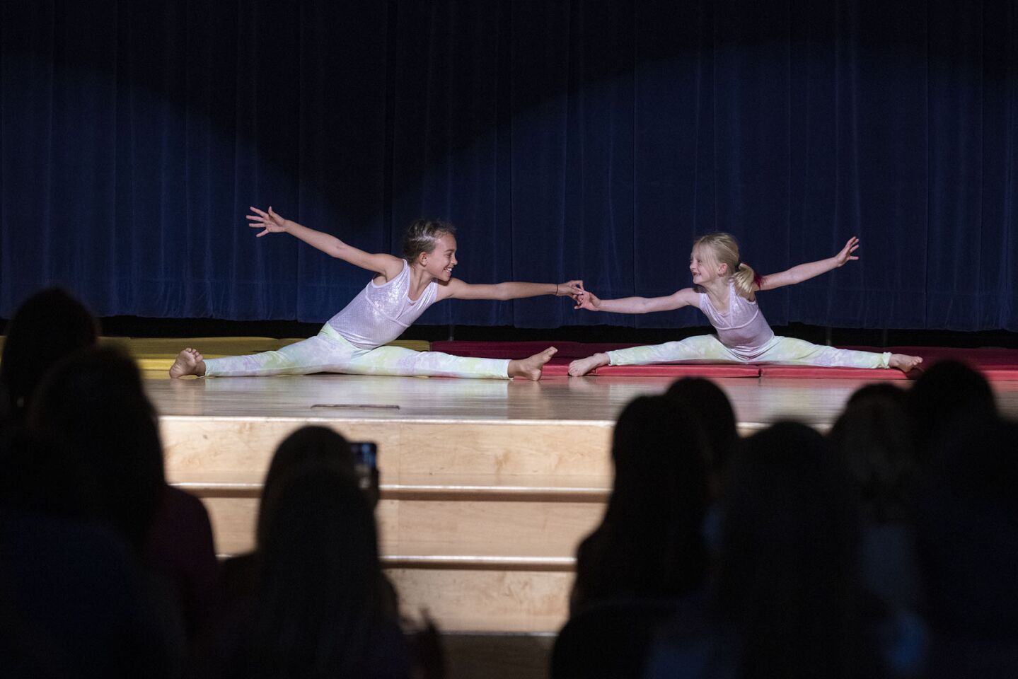 Zoe Bruner and Shay Seaman performed a gymnastic routine to "Party in the USA"