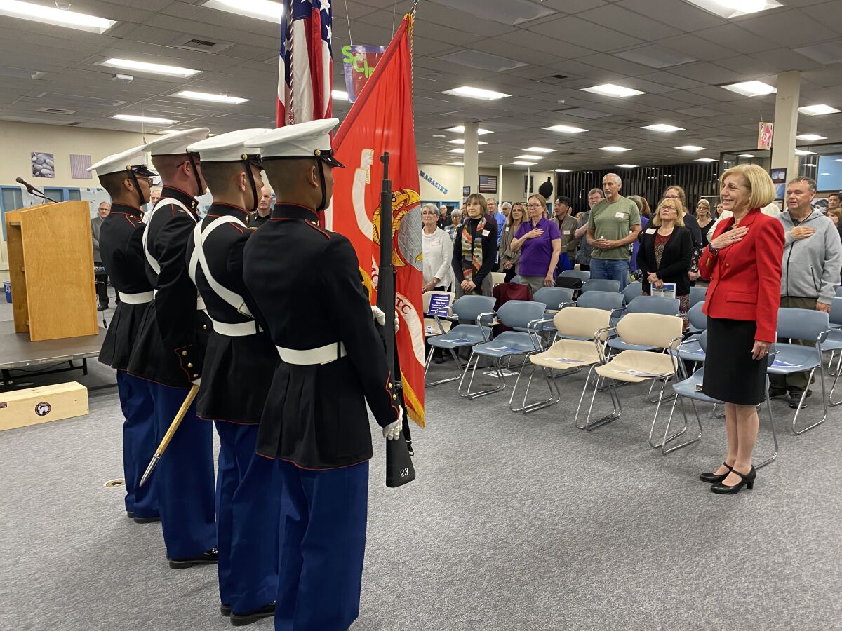 University City High School Junior ROTC members perform a presentation of the colors for Bry and the audience before the program.
