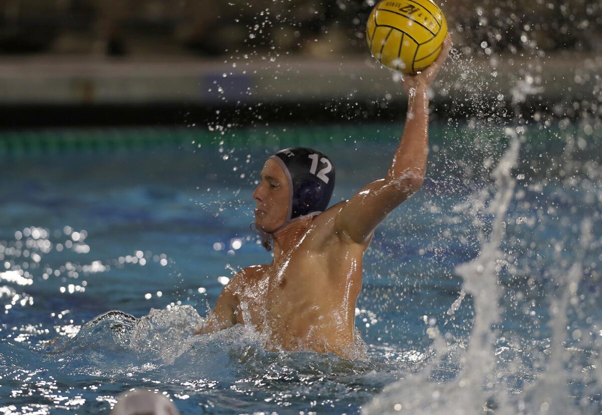 Newport Harbor's Tommy Kennedy handles the ball against Oaks Christian in the first round of the CIF Southern Section Division 1 playoffs on Thursday.