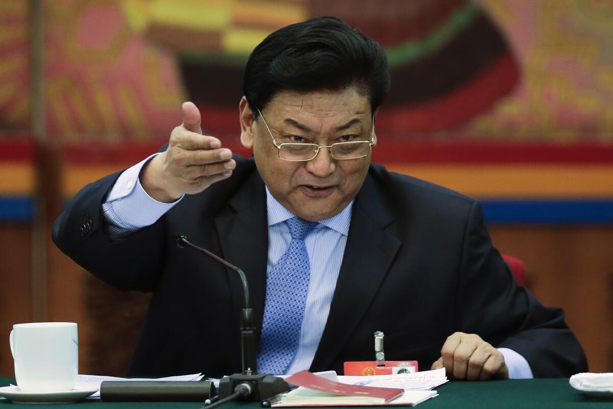 Padma Choling, chairman of the Tibetan Autonomous Region’s People’s Congress standing committee, speaks at the Great Hall of the People in Beijing on March 7, 2016.