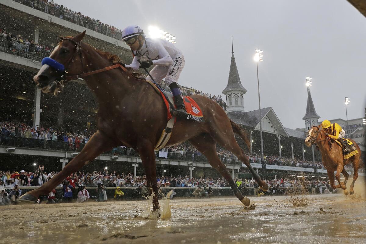 FILE - In this May 5, 2018, file photo, Mike Smith rides Justify to victory during Kentucky Derby.