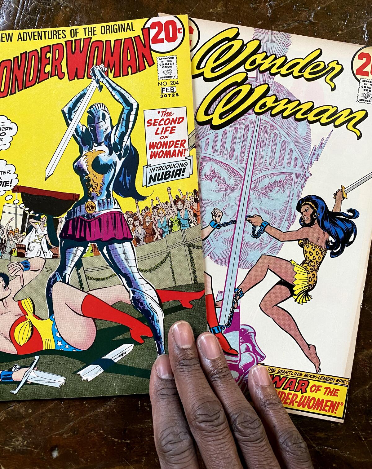 Wonder Woman comic book covers from the 1970s that feature Nubia.