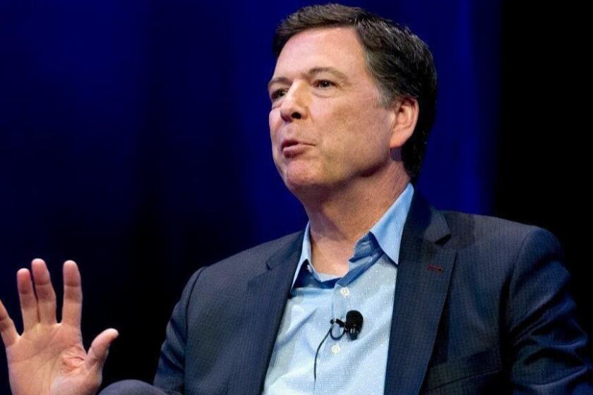 FILE - In this April 30, 2018, file photo, former FBI director James Comey speaks during a stop on his book tour in Washington. Comey is about to get dinged in an internal review by the Justice Department, and President Donald Trump says he canâ€™t wait. (AP Photo/Jose Luis Magana, File)