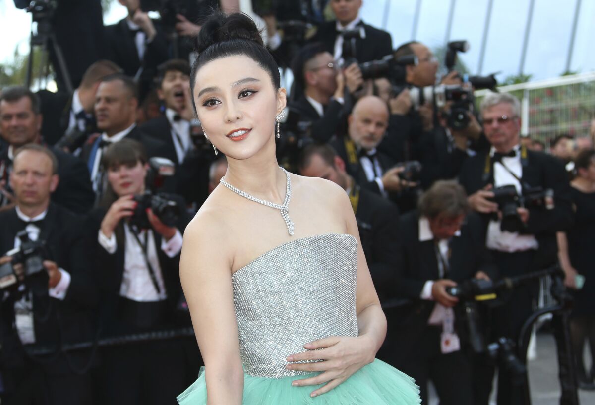 Actor Fan Bingbing in a gown on the red carpet.