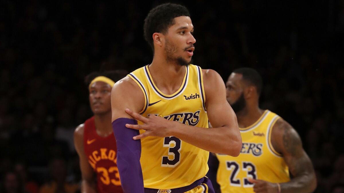 Lakers guard Josh Hart celebrates after scoring a three-point shot against the Pacers.